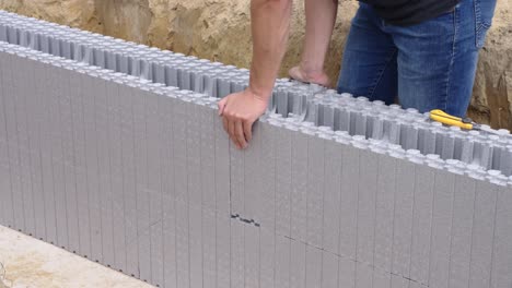 Placing-piece-of-ICF-block-in-joint