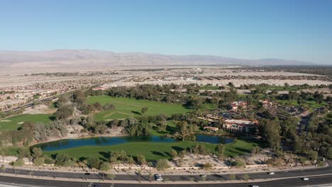 Wide-aerial-dolly-shot-of-a-lush-golf-resort-in-Palm-Desert