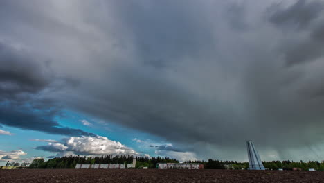 A-rainstorm-hits-a-small-European-village---dramatic-cloudscape-time-lapse