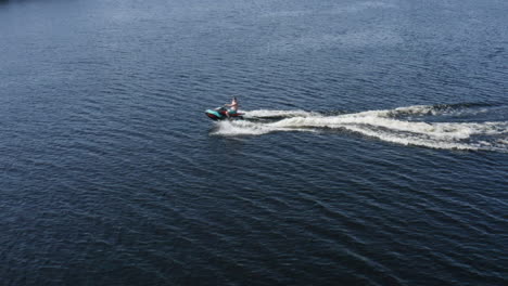 Aerial-view-of-water-scooter-jetski-on-river-water