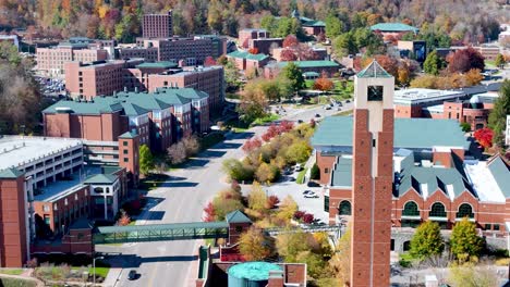 aerial-push-in-to-appalachian-state-university-campus-in-autumn-in-boone-nc,-north-carolina