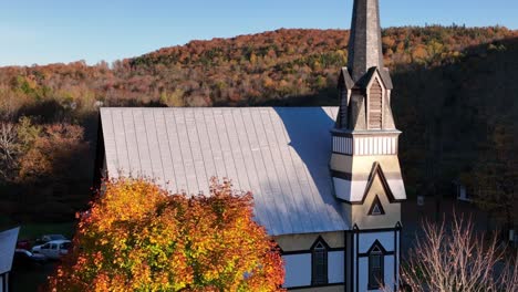 East-Orange-Vermont-Church-aerial-tilt-up-from-sugar-maple