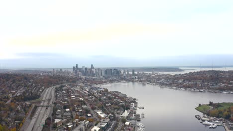 Aerial-view-of-Lake-Union-connecting-multiple-Seattle-neighborhoods-on-an-overcast-day