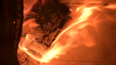 VERTICAL-fire-flame-close-up-of-wood-burning