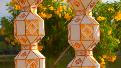Richly-decorated-paper-lanterns-softly-waving-in-wind-in-nature