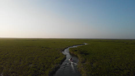 Boat-sailing-in-Sian-Ka'an-Mexico-mangrove-ecosystem