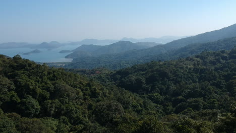 Aerial-Dolly-In-country-park-in-Hong-Kong,-Islands-in-Distance