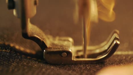 Close-up-slow-motion-image-of-sewing-machine-at-work