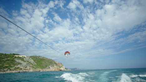 parasailing-is-done-over-the-boat