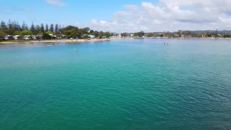 People-enjoying-the-turquoise-waters--Tallebudgera-Creek-Queensland-Australia