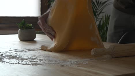 Preparing-fresh-rolled-tasty-delicious-pasta-dough-ingredients-in-home-kitchen