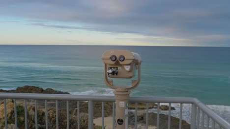 Binoculars-Telescope-At-The-Elephant-Rock-Lookout---Calm-Sea-From-Currumbin-Beach-In-Sunset--Gold-Coast,-Queensland,-Australia
