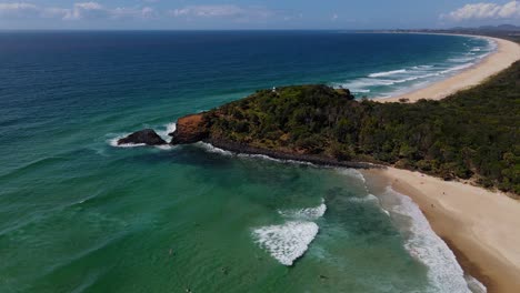 Tasman-Sea-Waves---Fingal-Head-Beach-With-Tourists-Surfing-And-Swimming-In-Summer---New-South-Wales,-Australia