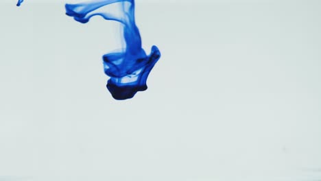ink-dropping-into-water,-slowmotion-in-4k-resolution,-great-for-musicvideos,-intros-or-wallpapers