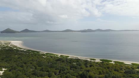 Panoramic-View-Of-Empty-Beach,-Mount-Yacaaba,-Karuah-River,-And-Tomaree-Mountain-In-Summer---Jimmys-Beach-And-Waynderrabah-Beach-In-Hawks-Nest,-Australia