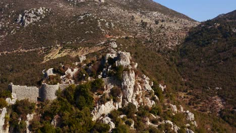 Aerial-view-of-the-castle-ruins-on-the-top-of-the-mountain