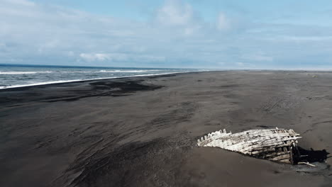 Drone-footage-of-old-wooden-shipwreck-on-the-coast-of-Iceland