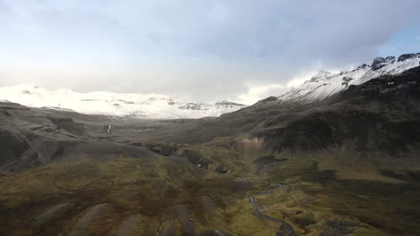 Drone-footage-of-snow-covered-mountains-in-Iceland