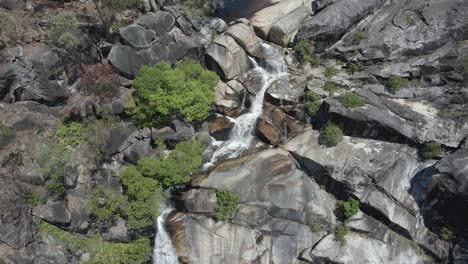 Aerial-View-Of-Davies-Creek-Falls-In-The-Far-North-Region-Of-Queensland,-Australia---drone-shot