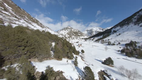 Drone-flying-over-snowcapped-landscape-of-Pyrenees-mountains