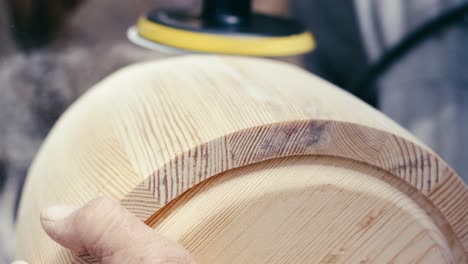Using-orbital-sander-sanding-white-oak-timber-smooth