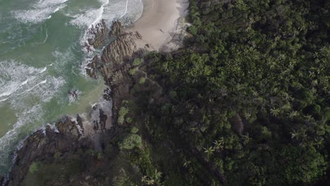 Fly-Over-Dense-Tropical-Rainforest-With-Secluded-Beaches-At-Broken-Head-Nature-Reserve-Near-Byron-Bay,-NSW-Australia