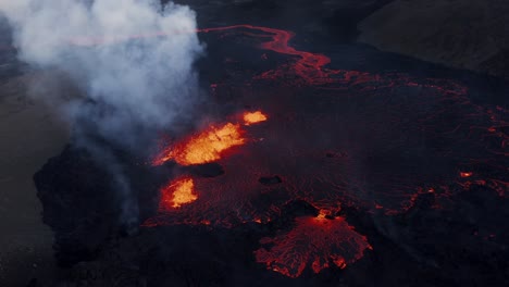 New-Fissure-Volcano-in-Fagradalsfjall-Iceland-during-2022-eruption,-toxic-smoke-rising,-lava-field