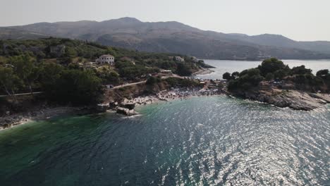Aerial-view-of-Bataria-Beach,-Small-turquoise-beach-in-Kassiopi-coastline,-Corfu
