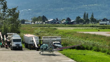 Training-Pilot-On-Small-Helicopter-Preparing-To-Take-Off-At-Chilliwack-Airport-Flight-School