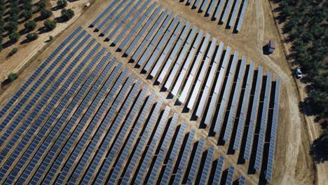 Solar-Power-Plant,-Aerial-View-of-Massive-Solar-Panels-Array-in-Countryside-of-Spain,-Birds-Eye-Drone-Shot
