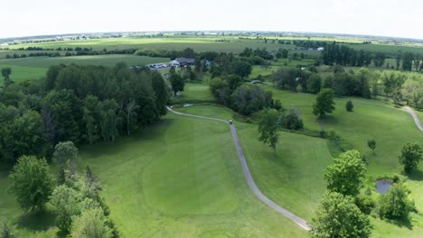 Greens,-fairways,-cart-paths-and-club-house-of-golf-course