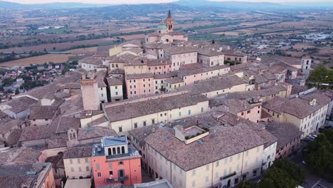 Aerial-view-on-The-Duomo-of-Sant'-Emiliano,-a-Romanesque-church-located-in-TREVI-and-on-the-watch-tower