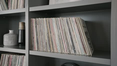 old-vinyl-records-on-the-shelf-inside-of-a-home