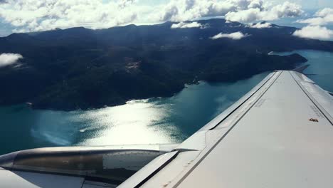 An-aircraft-flying-over-Koh-Samui-is-taking-a-turn-to-the-right