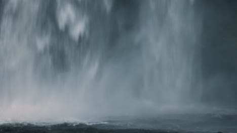 Big-White-Waterfall-Crashing-Down-with-Rough-Water-Below-in-Wales-UK-4K