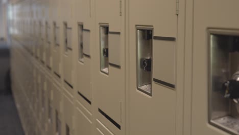 Rack-focus-of-lockers-in-a-high-school-hallway,-empty-corridor,-hall