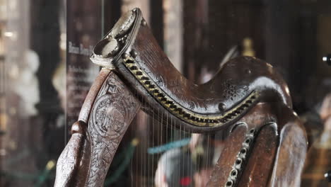 Famous-Medieval-14th-Century-Irish-Trinity-harp-in-the-Library-of-Trinity-College