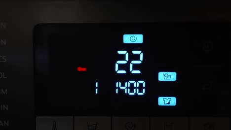Modern-Digital-Control-Panel-Display-Of-The-Washing-Machine-With-Illuminated-Numbers