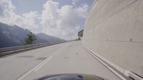 Driving-a-car-on-the-Gotthard-Pass-from-South-to-North-Switzerland