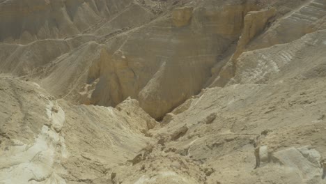Flying-Over-Yellow-Desert-Cliff-in-the-Negev-Canyon