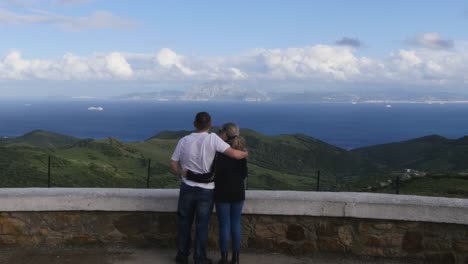 Looking-towards-North-Africa-from-Spain-Camera-=-Static-shot-of-a-couple-looking-Looking-towards-North-Africa-from-a-view-point-near-to-Tarifa-in-Spain