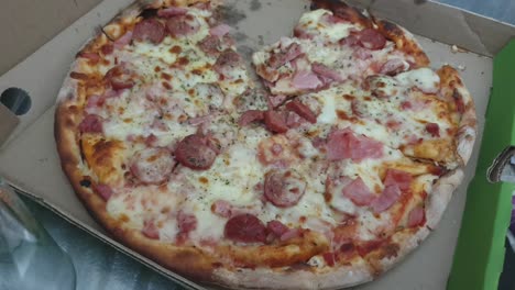 Pizza-perfect,-extra-melting-cheddar-cheese,-extra-salami-and-pepperoni-toppings-served-hot,-enjoy-right-out-of-the-box