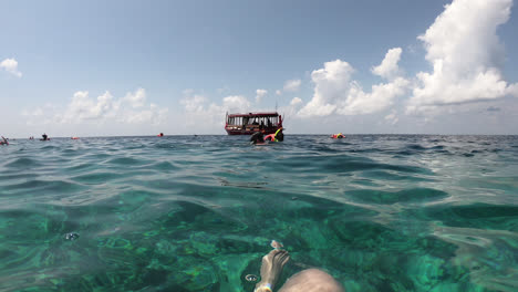snorkeling-in-ocean-sea-at-Maldives