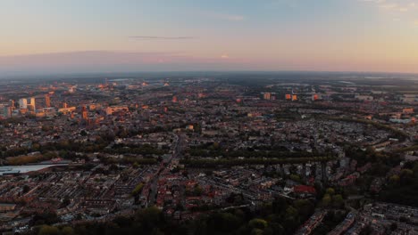 Aerial-sunset-view-of-modern-city-center-and-industrial-centre-of-Utrecht