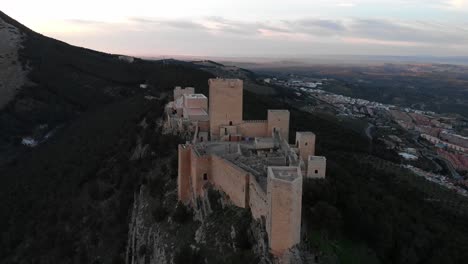Jaen's-Castle-Saint-Catalina-Castle-Spain-shoot-with-a-drone-at-4k-24fps-showing-the-exterior-and-the-city-from-multiple-points-on-a-afternoon-in-December