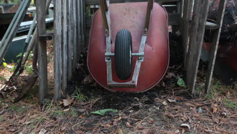 still-shot-of-wheelbarrow-parked-in-compost-bin