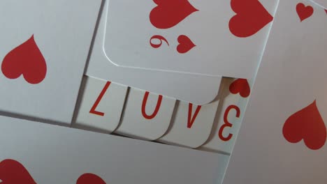 Playing-cards-showing-the-word-LOVE