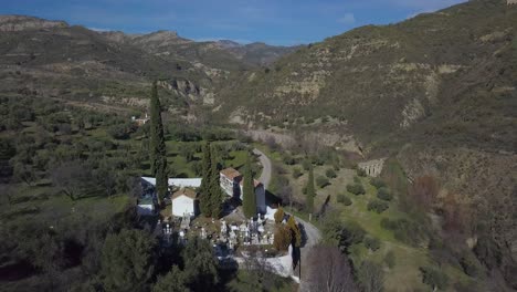 Aerial-shot-of-an-old-spanish-cemetery-in-the-mountains