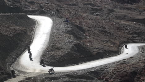 Motorcycles-driving-on-a-winding-mountain-road