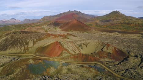 Aerial-backwards-showing-red-volcanic-craters-in-Snaefellsnes-Iceland